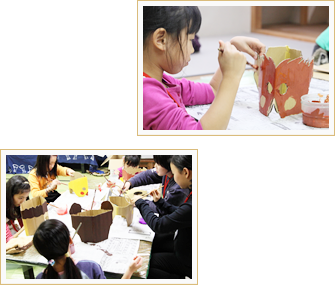 絵の具で色を塗ったり、さらに飾りをつけたりして仕上げる。